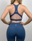 ORIGIN POCKETED HIGH WAISTED CROSSOVER BUTT SCULPT FLARED LEGGINGS